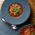 Overhead fasolia, Middle Eastern lamb and butter bean stew.