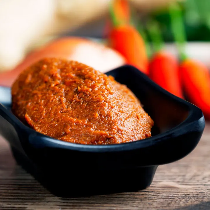 Homemade Red Thai curry paste presented in a bowl.