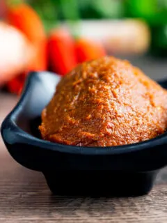 Homemade easy Red Thai curry paste presented in a bowl.