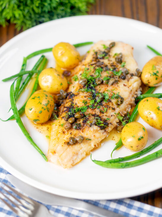 Whole pan-fried lemon sole with a caper and butter sauce.