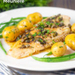 Whole pan-fried lemon sole meuniere served with new potatoes and green beans featuring a title overlay.