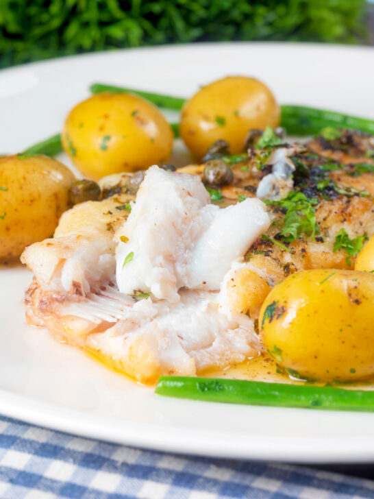 Whole lemon sole meuniere showing the texture of the cooked flesh.
