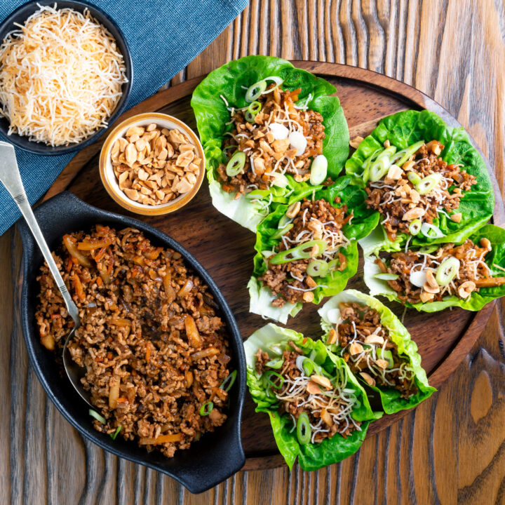 Overhead Chinese takeaway style minced pork yuk sung lettuce wraps.