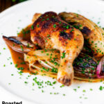 Roasted chicken leg, chicory or Belgian endive and shallots with balsamic gravy featuring a title overlay.