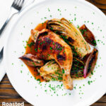 Overhead roasted chicken leg, chicory or Belgian endive and shallots with balsamic gravy featuring a title overlay.