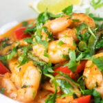 Thai shrimp panang curry with jasmine rice and fresh coriander.