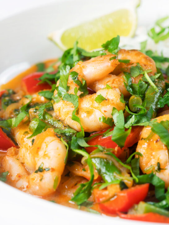 Thai shrimp panang curry with jasmine rice and fresh coriander.