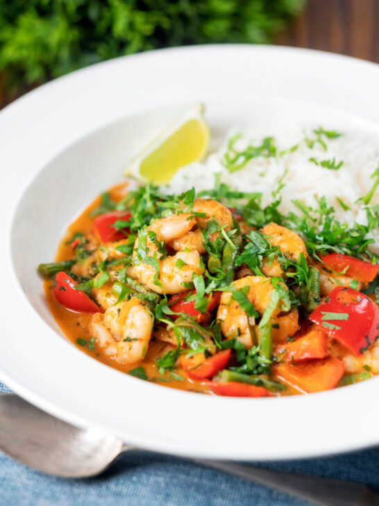 Thai prawn panang curry with jasmine rice and fresh coriander.