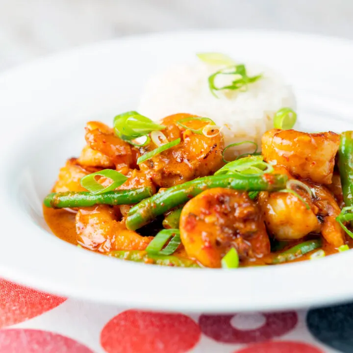 Thai red prawn or shrimp curry with green beans in a coconut milk sauce.