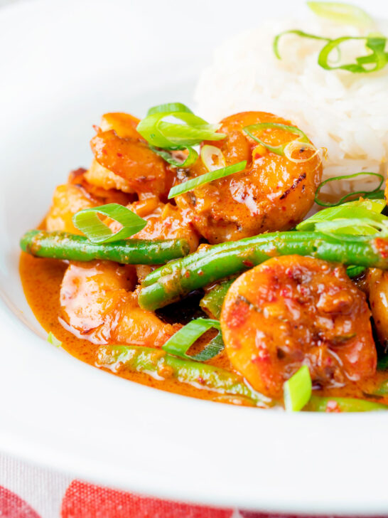 Thai red prawn curry with green beans served with rice.