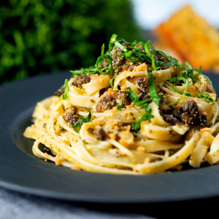 Canned tuna pesto pasta with fried capers, golden breadcrumbs and fresh basil.