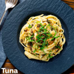 Overhead tuna pesto pasta with crispy capers, golden breadcrumbs and fresh basil featuring a title overlay.