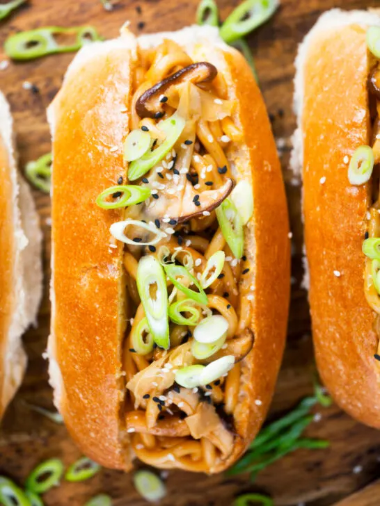 Japanese yakisoba pan stir-fried udon noodles with pickled ginger and spring onions in a bun.