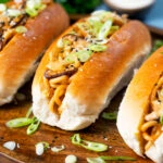 Japanese yakisoba pan stir-fried udon noodles served in a hot dog bun.