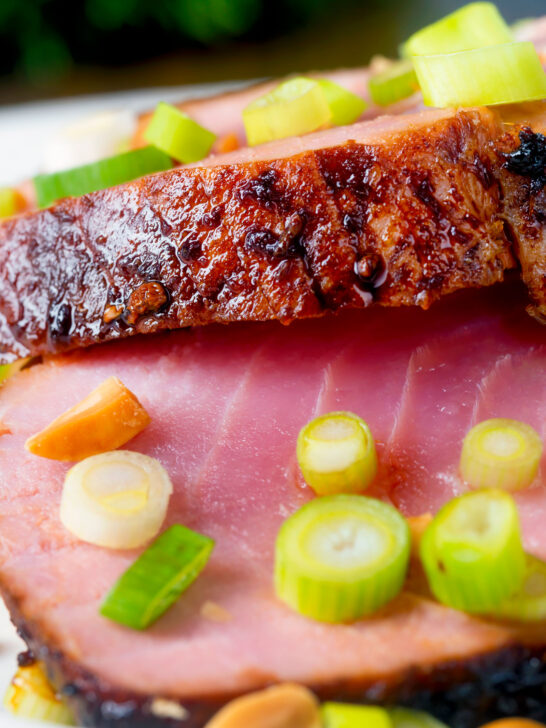 Close-up roasted tuna steak with a honey and soy glaze.