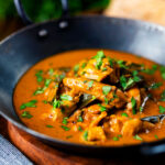 Sri Lankan influenced chicken Ceylon curry with homemade chapatis.