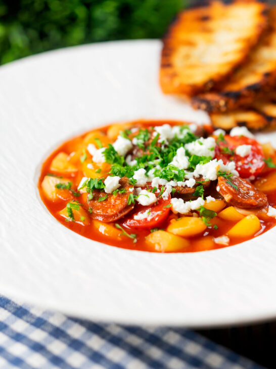 Spanish chorizo and butter bean stew with crumbled feta cheese and parsley.