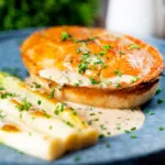 Individual ham and apple fidget pie with a cider cream sauce.