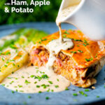 Individual ham, potato and apple fidget pie, cut open to show filling with a cider cream sauce featuring a title overlay.