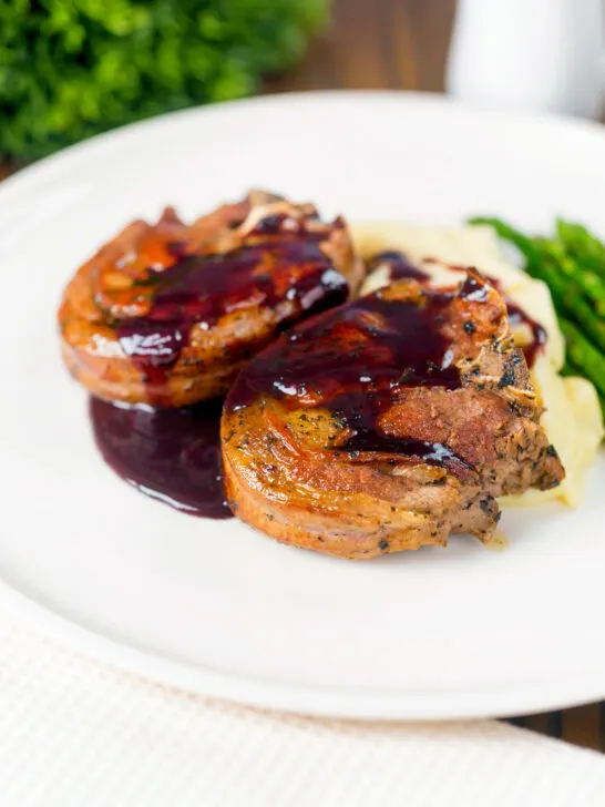 Minted lamb chops with red wine sauce, mashed potato and asparagus.