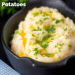 Creamy, buttery and perfectly fluffy mashed potatoes with fresh parsley garnish featuring a title overlay.