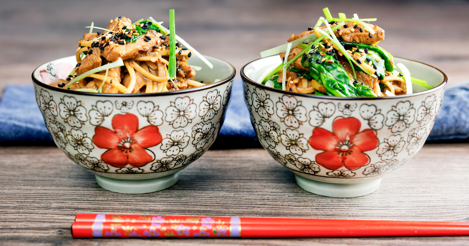 Tenderloin pork noodle stir fry with garlic, Szechuan pepper and spinach.