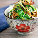 Quick and easy pork noodle stir fry with ginger and Szechuan pepper.