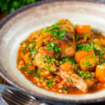 Old fashioned braised rabbit leg stew with pearl barley.