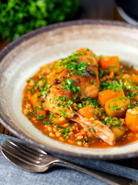 Old fashioned braised rabbit leg stew with pearl barley.