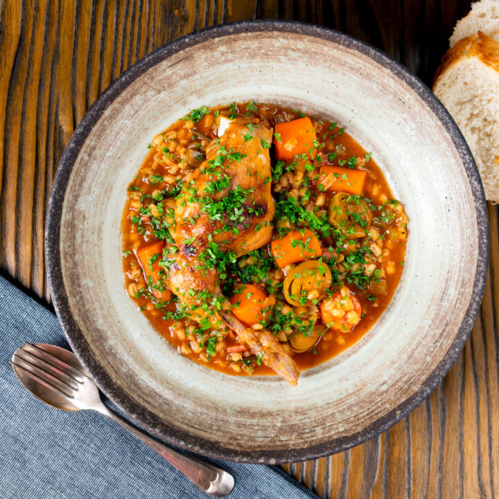 Rabbit leg stew with pearl barley, carrots and leeks.