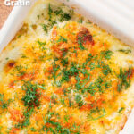 Overhead close-up cheesy smoked haddock and potato gratin and fresh dill featuring a title overlay.