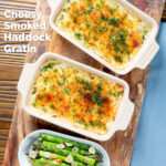 Individual cheesy smoked haddock and potato gratin and fresh dill featuring a title overlay.