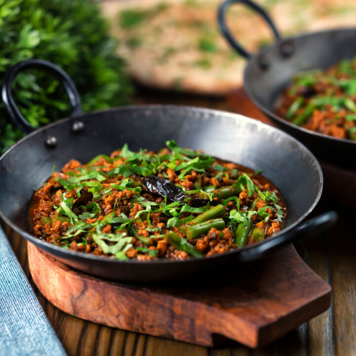 Spicy Indian-influenced chicken keema curry with green beans and coriander.