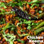 Close-up Indian chicken keema curry with green beans and fresh coriander featuring a title overlay.