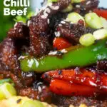 Chinese takeaway style sticky crispy chilli beef with peppers and egg fried rice featuring a title overlay.