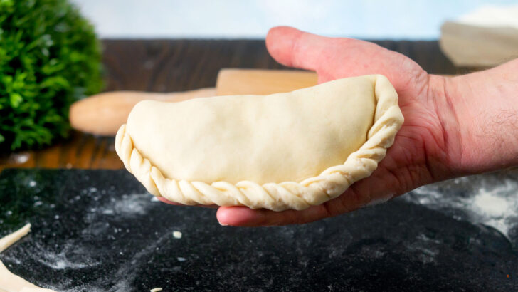 Part 9 of 9: Photographic instructions of how to crimp a British pasty style pie.