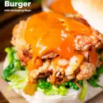 Korean fried chicken burger with gochujang mayo and kimchi featuring a title overlay.