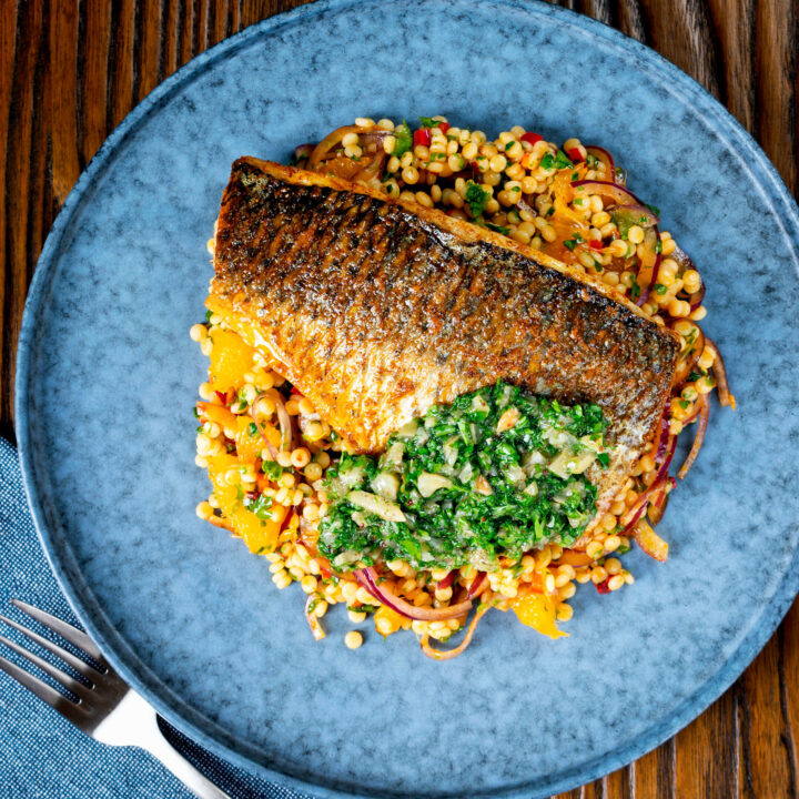 Pan fried grey mullet with a preserved lemon sauce served with giant couscous salad.