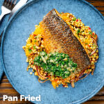 Overhead pan fried grey mullet fillet served with preserved lemons and parsley and giant couscous featuring a title overlay.