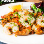 King prawn and chorizo paella with artichoke hearts and green beans featuring a title overlay.
