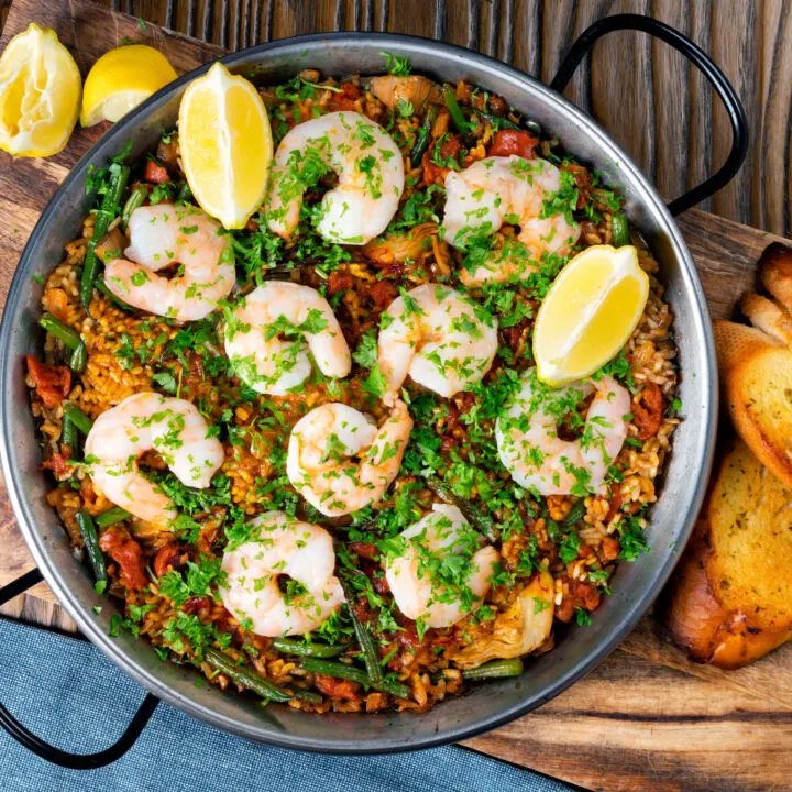 King prawn and chorizo paella cooked swerved with lemon and parsley.