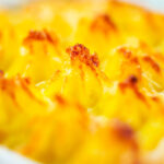 Close-up of mashed potato topping on a vegetarian shepherd's pie or shepherdess pie.