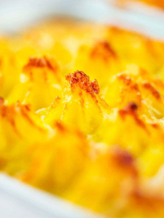 Close-up of mashed potato topping on a vegetarian shepherd's pie or shepherdess pie.
