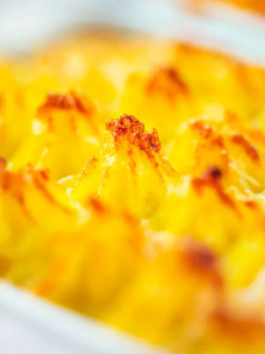 Close-up of mashed potato topping on a vegetarian shepherd's pie or shepherdess pie.