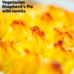 Close-up of mashed potato topping on a vegetarian shepherd's pie or shepherdess pie featuring a title overlay.