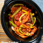 Overhead Crock Pot pork chops with peppers, tomatoes and Worcestershire sauce featuring a title overlay.