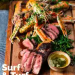 Surf and turf sharing board with steak, langoustine, garlic butter and samphire featuring a title overlay.