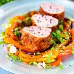 Sweet and sour pork tenderloin roast with mixed peppers featuring a title overlay.