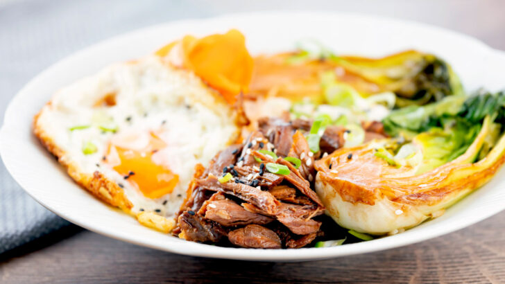 Wagamama-inspired teriyaki duck leg donburi rice bowl.