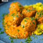 Venison meatballs in an Indian-style yoghurt-based curry sauce with pilau rice featuring a title overlay.